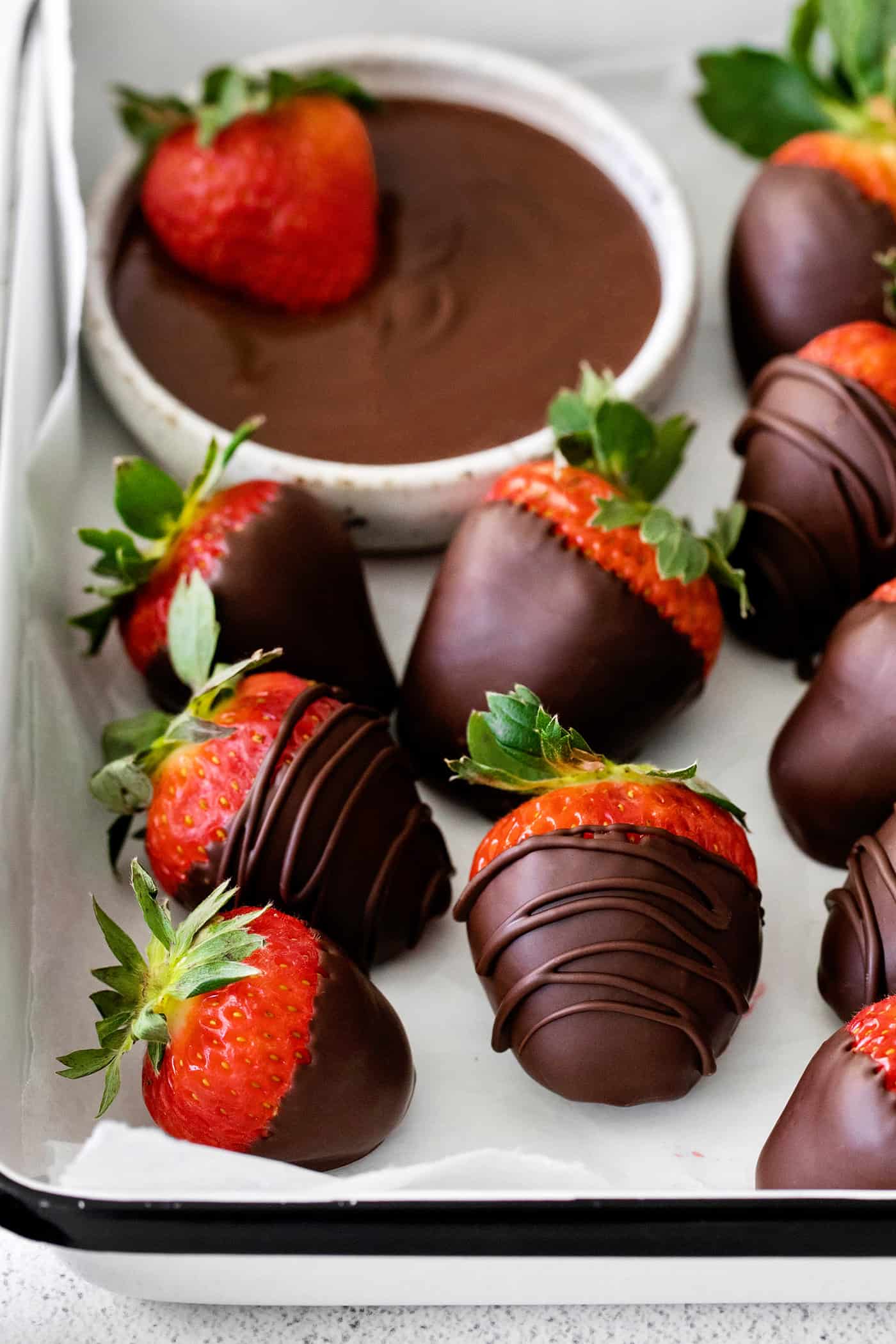 Close-up of chocolate covered strawberries on a dish