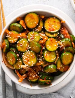 Overhead view of a bowl of cucumber kimchi