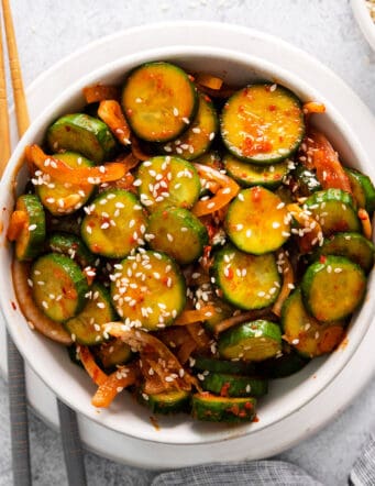 Overhead view of a bowl of cucumber kimchi