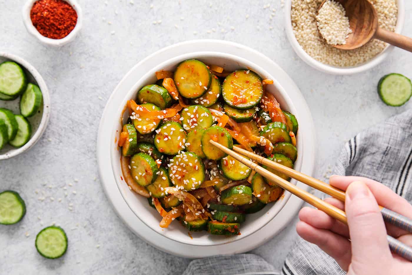 Toothpicks reaching for cucumber kimchi