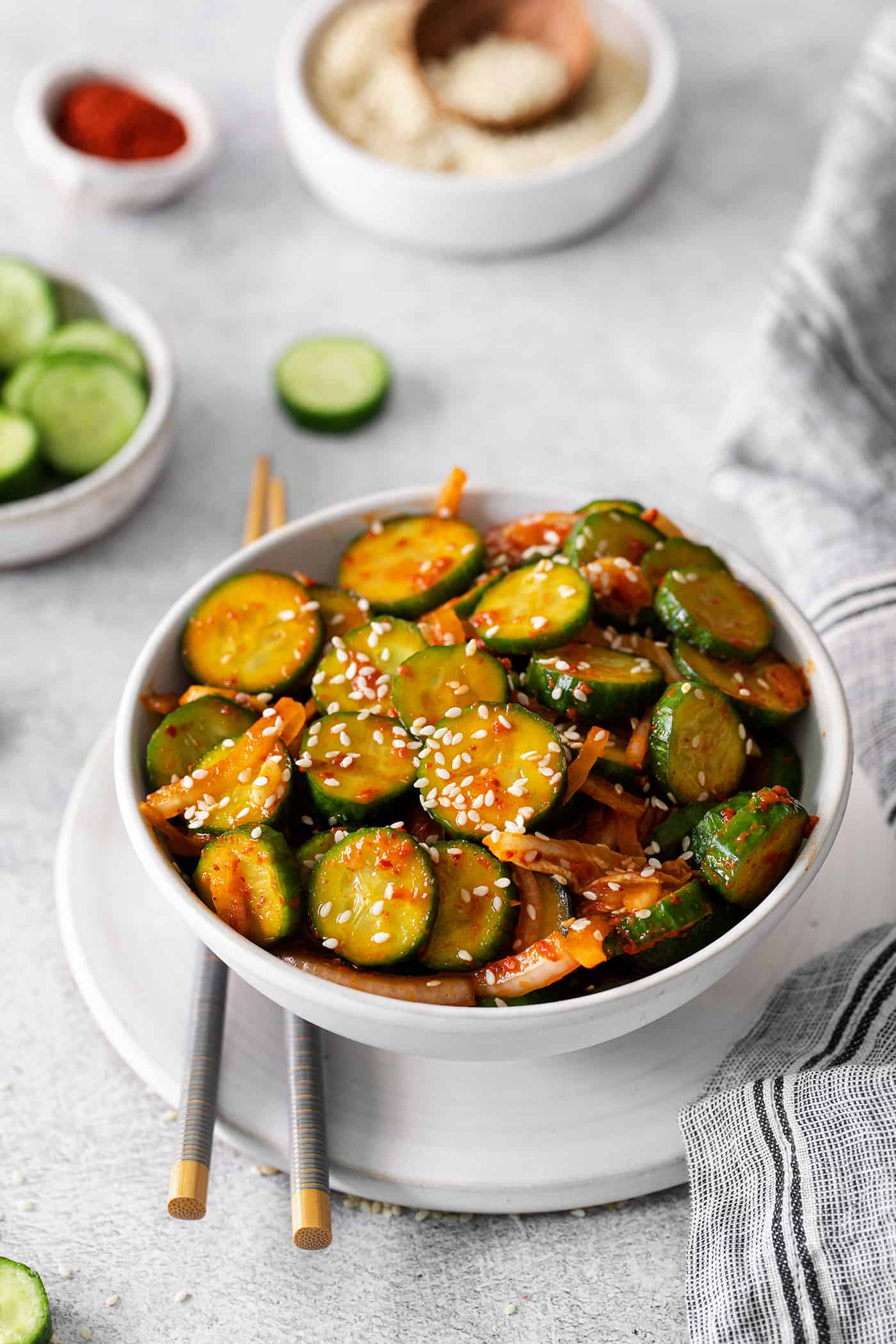 Angled view of a bowl of spicy cucumber salad