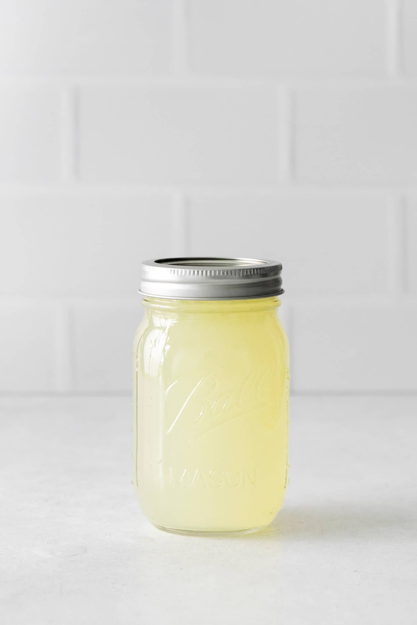 margarita mixture in a jar with the lid on