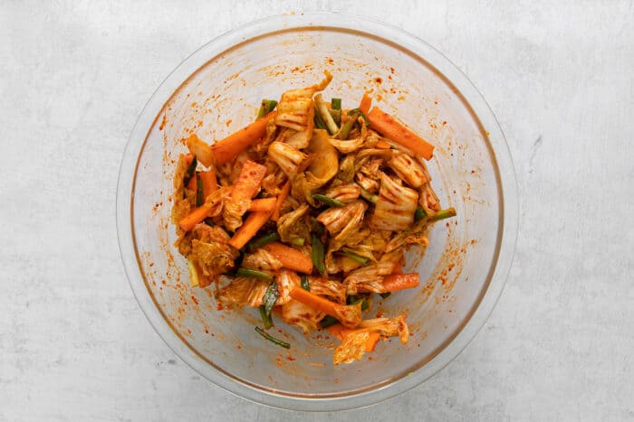 a clear bowl of homemade kimchi