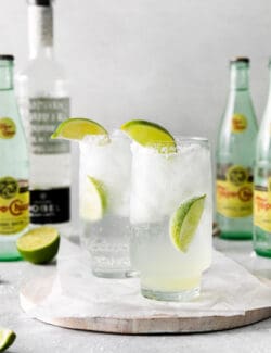 glasses of Texas ranch water cocktail with bottles of Topo Chico