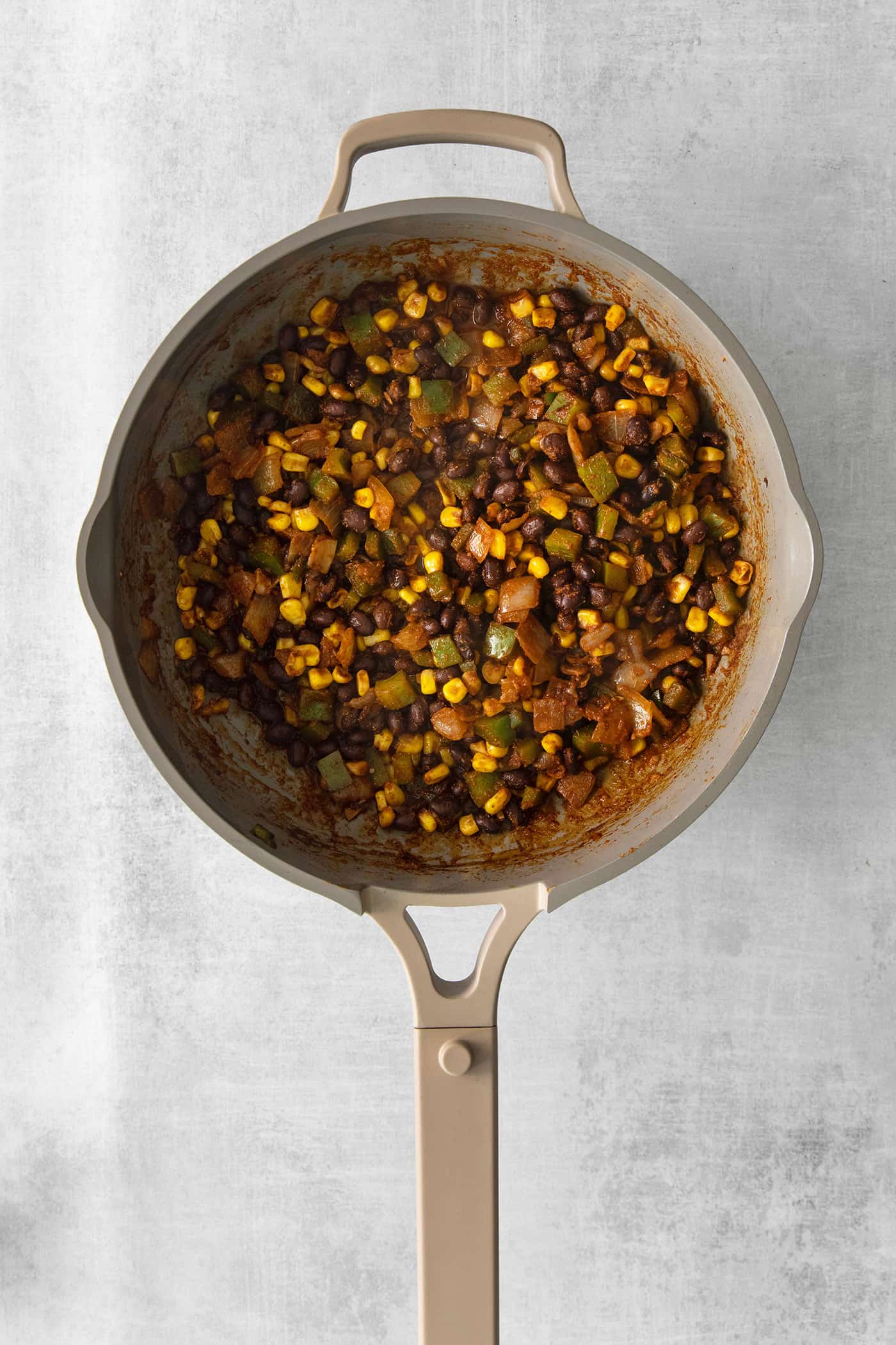 Taco stuffed sweet potato filling in a skillet