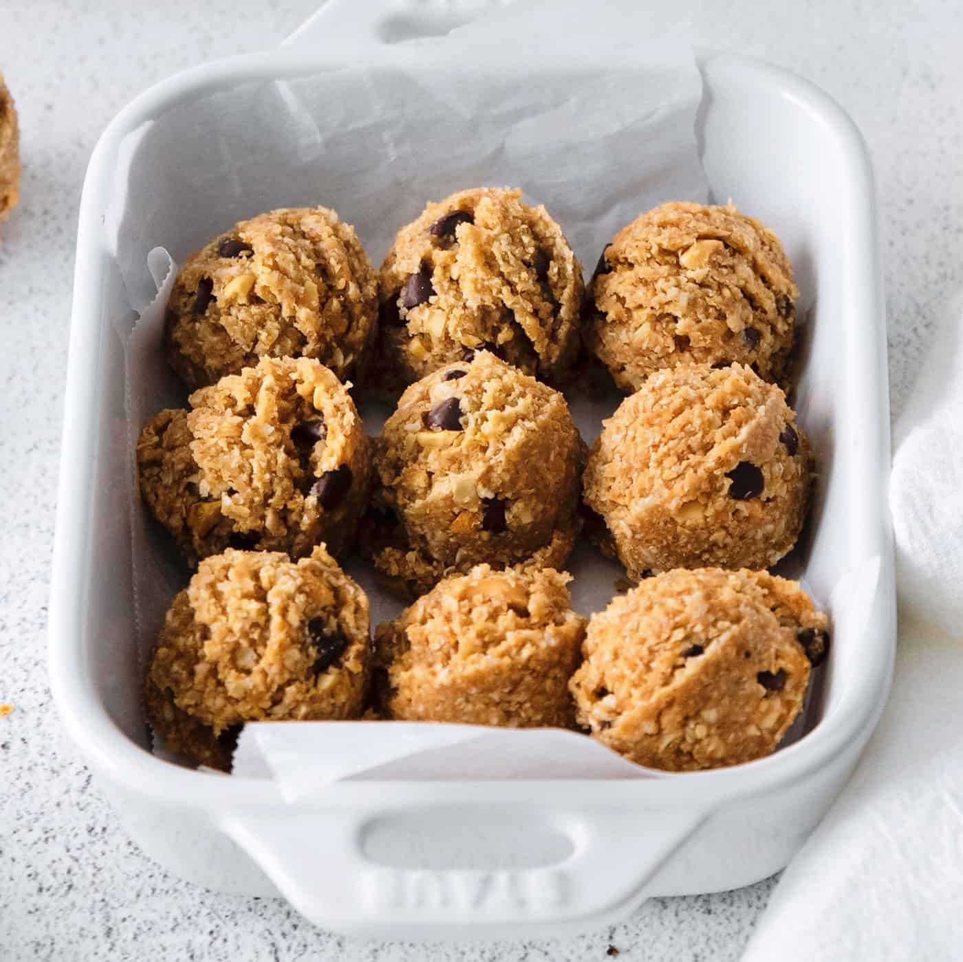 Peanut butter oat bites in a square casserole dish