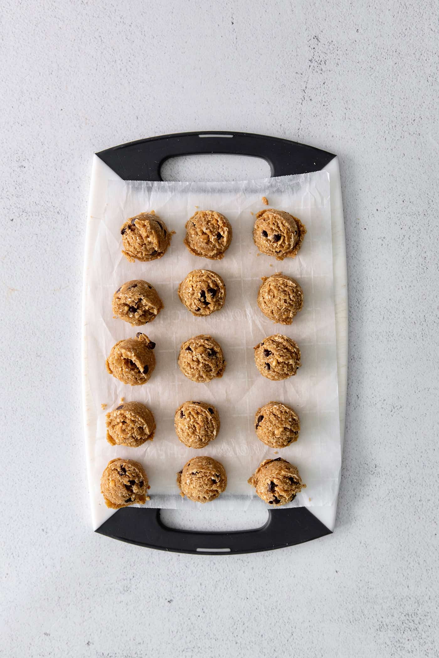 Overhead view of peanut butter oat bites on a cutting board