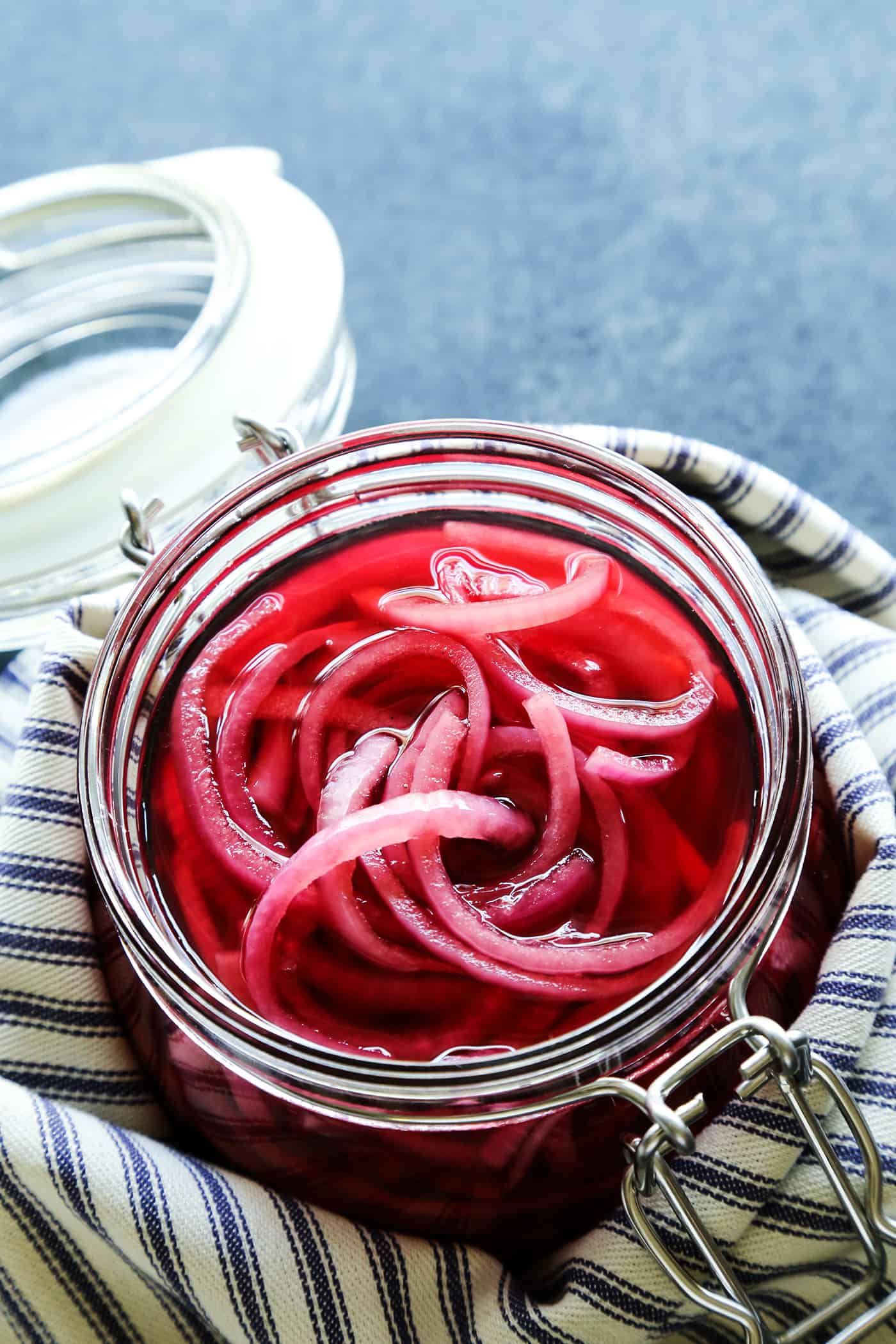 pickled red onions in a jar