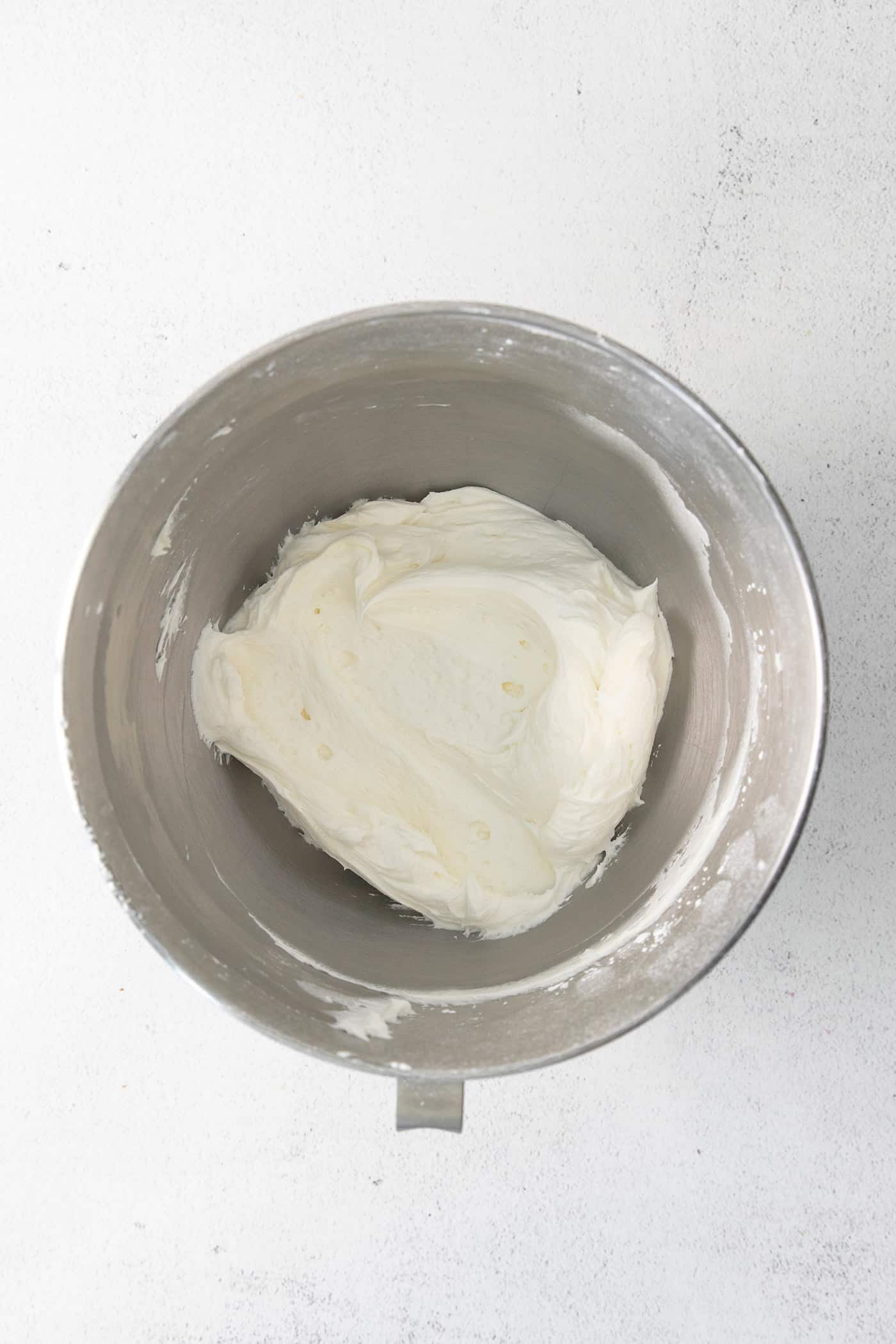 Cream cheese frosting in a mixing bowl