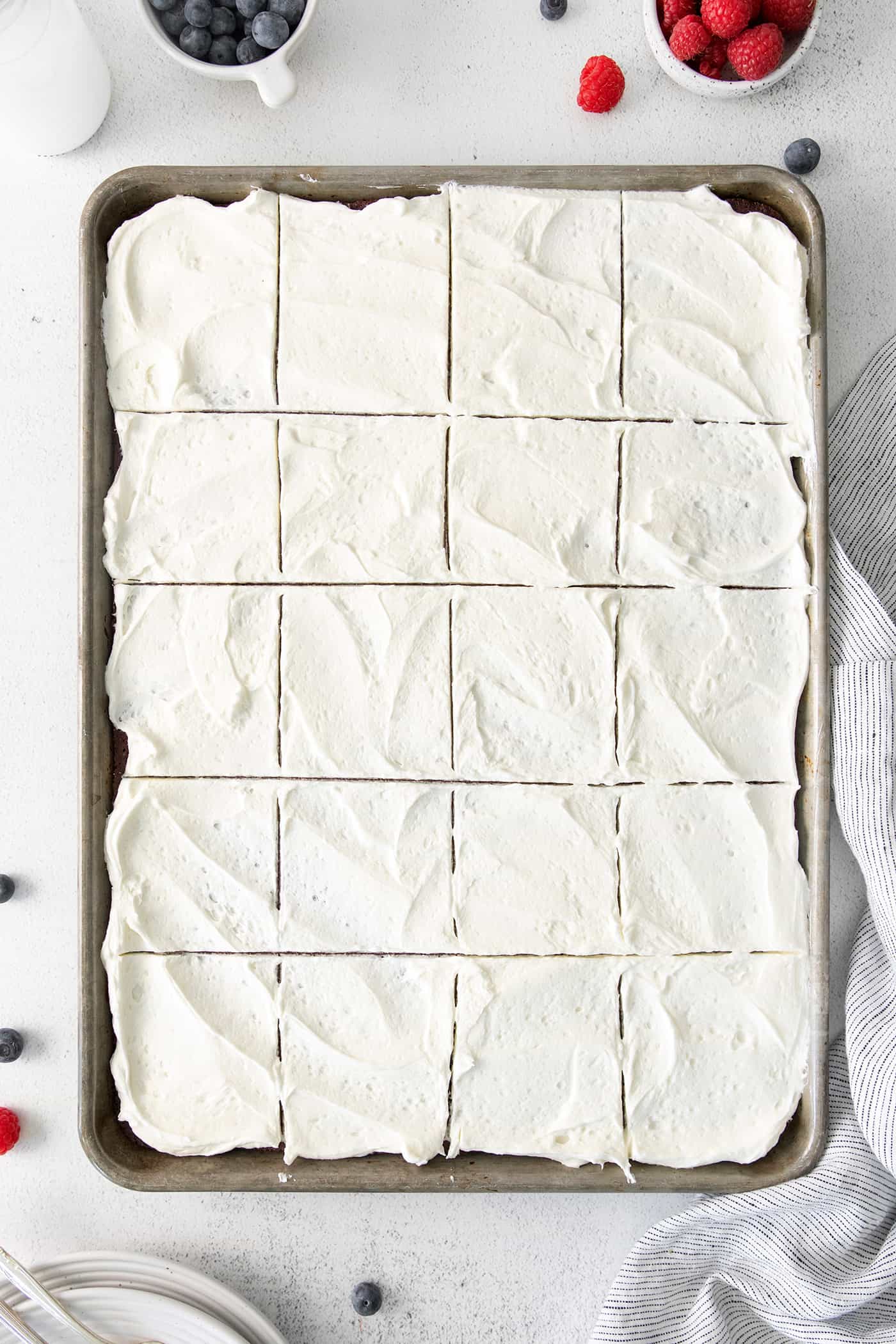 Frosted sheet cake cut into small squares