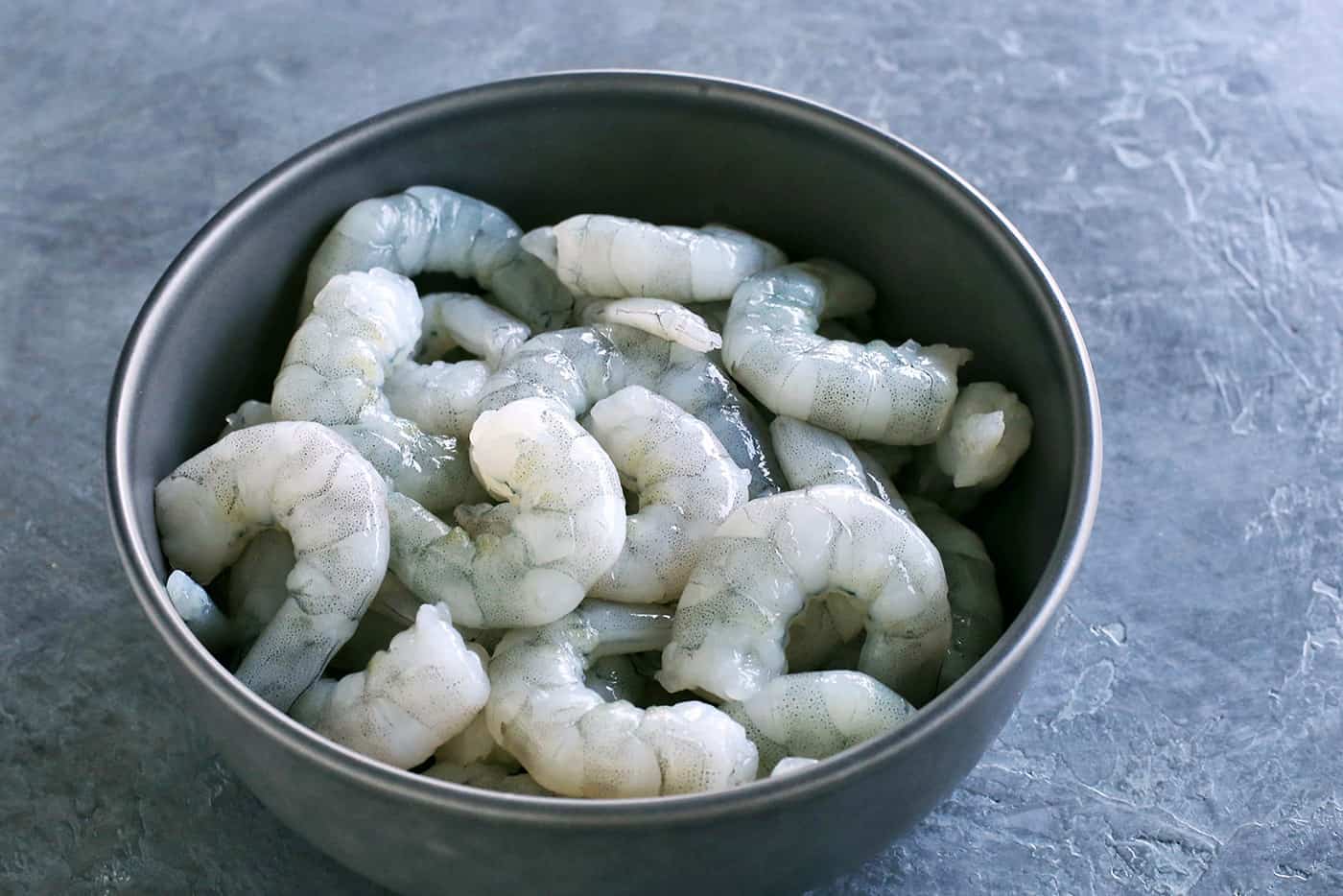 A bowl of raw shrimp