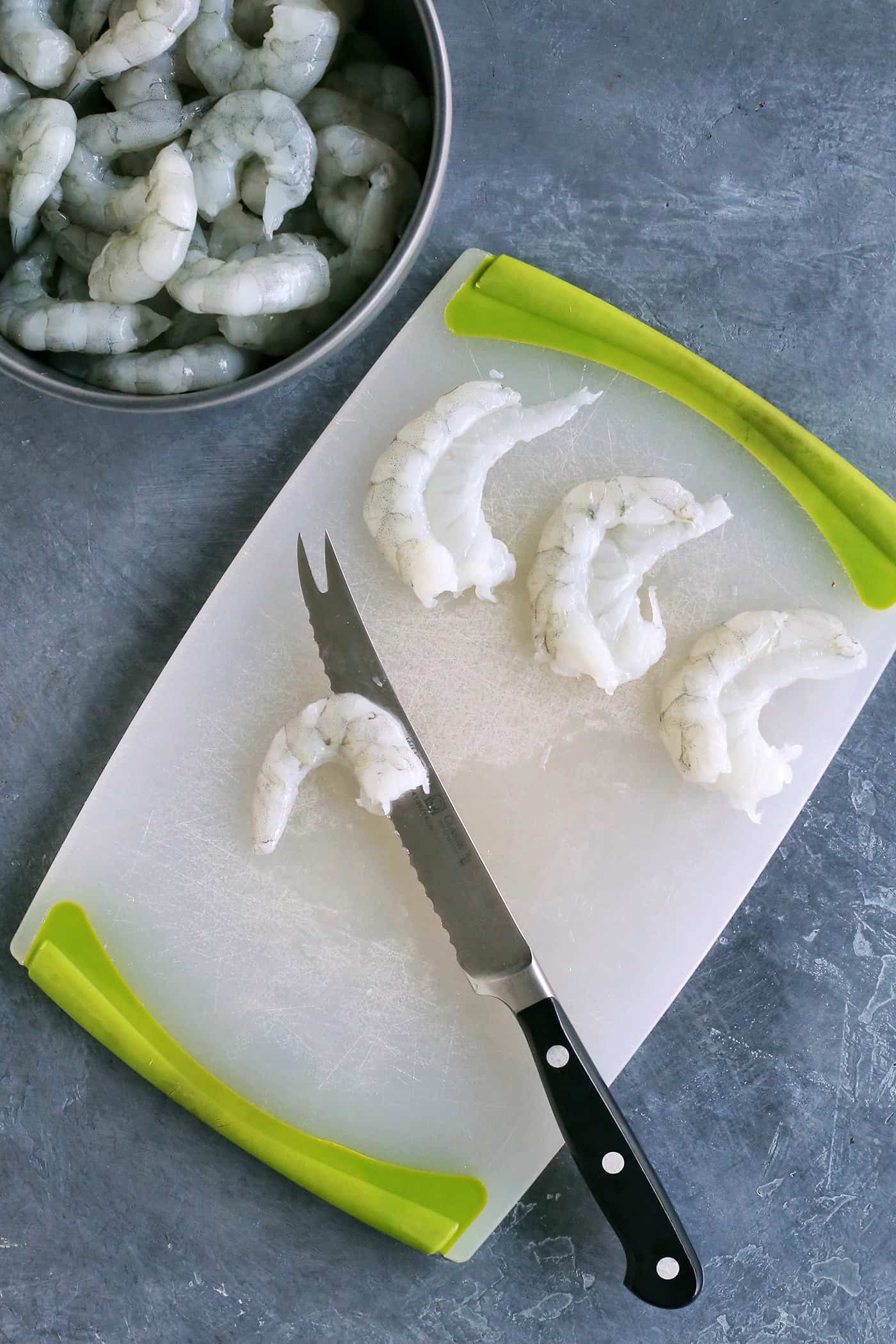 Raw shrimp sliced in half