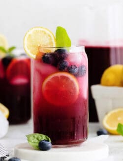 Front view of glasses of blueberry basil lemonade