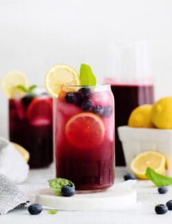 Glasses of blueberry basil lemonade