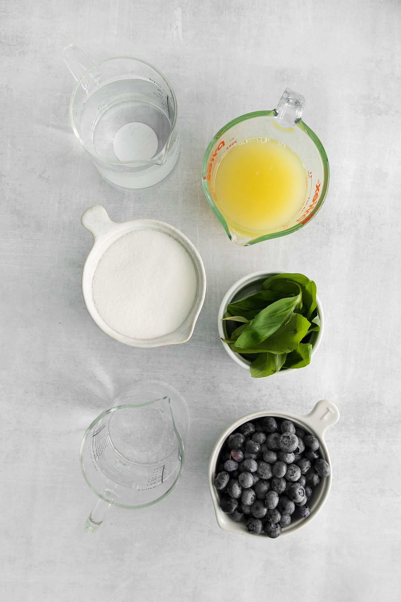 Overhead view of blueberry basil lemonade ingredients