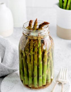 An open jar of asparagus
