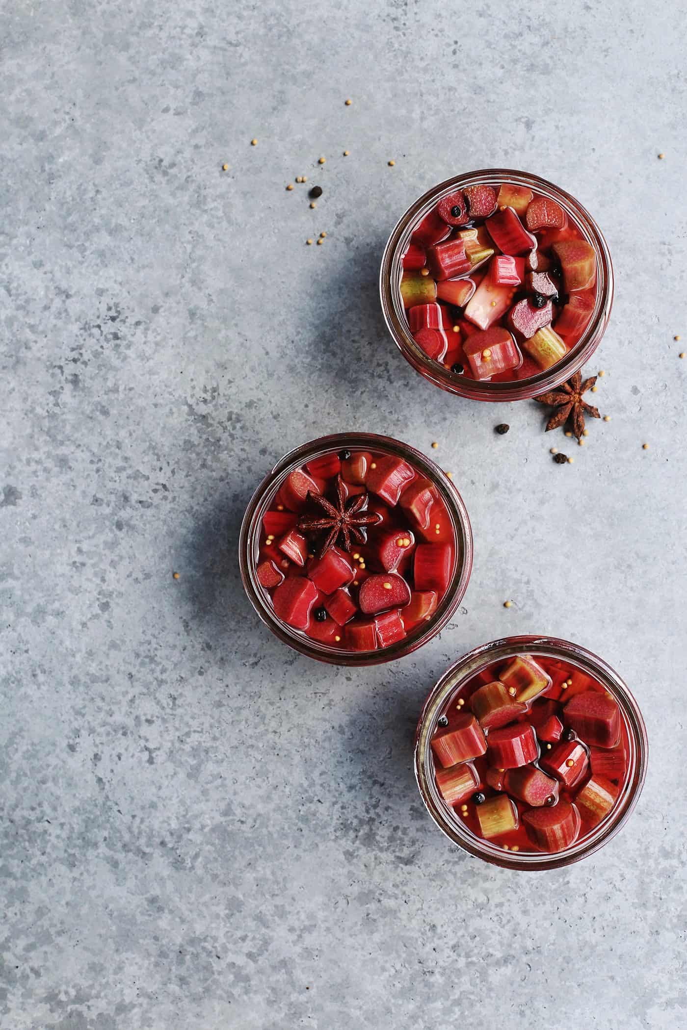 overhead view of 3 jars of pickled rhubarb