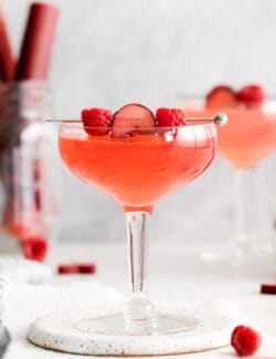 Two raspberry rhubarb cosmopolitans