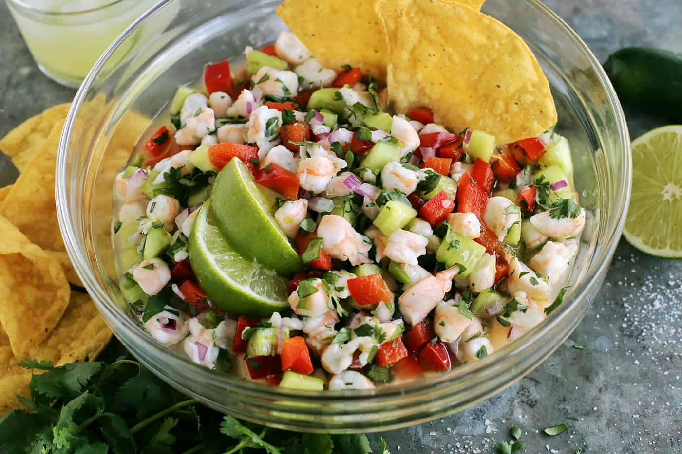Angled overhead view of a bowl of shrimp ceviche