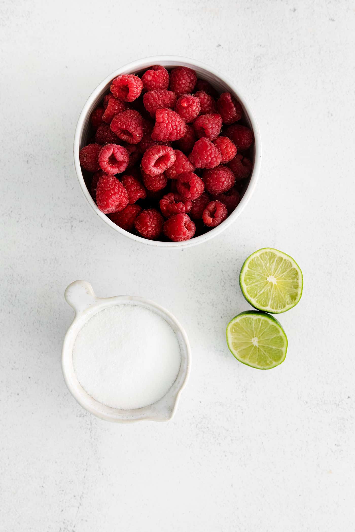 Overhead view of raspberry sauce ingredients