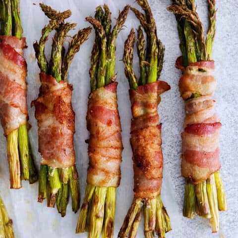 Overhead views of bundles of bacon wrapped asparagus