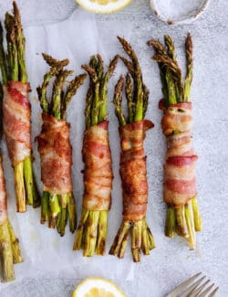Overhead views of bacon wrapped asparagus bundles
