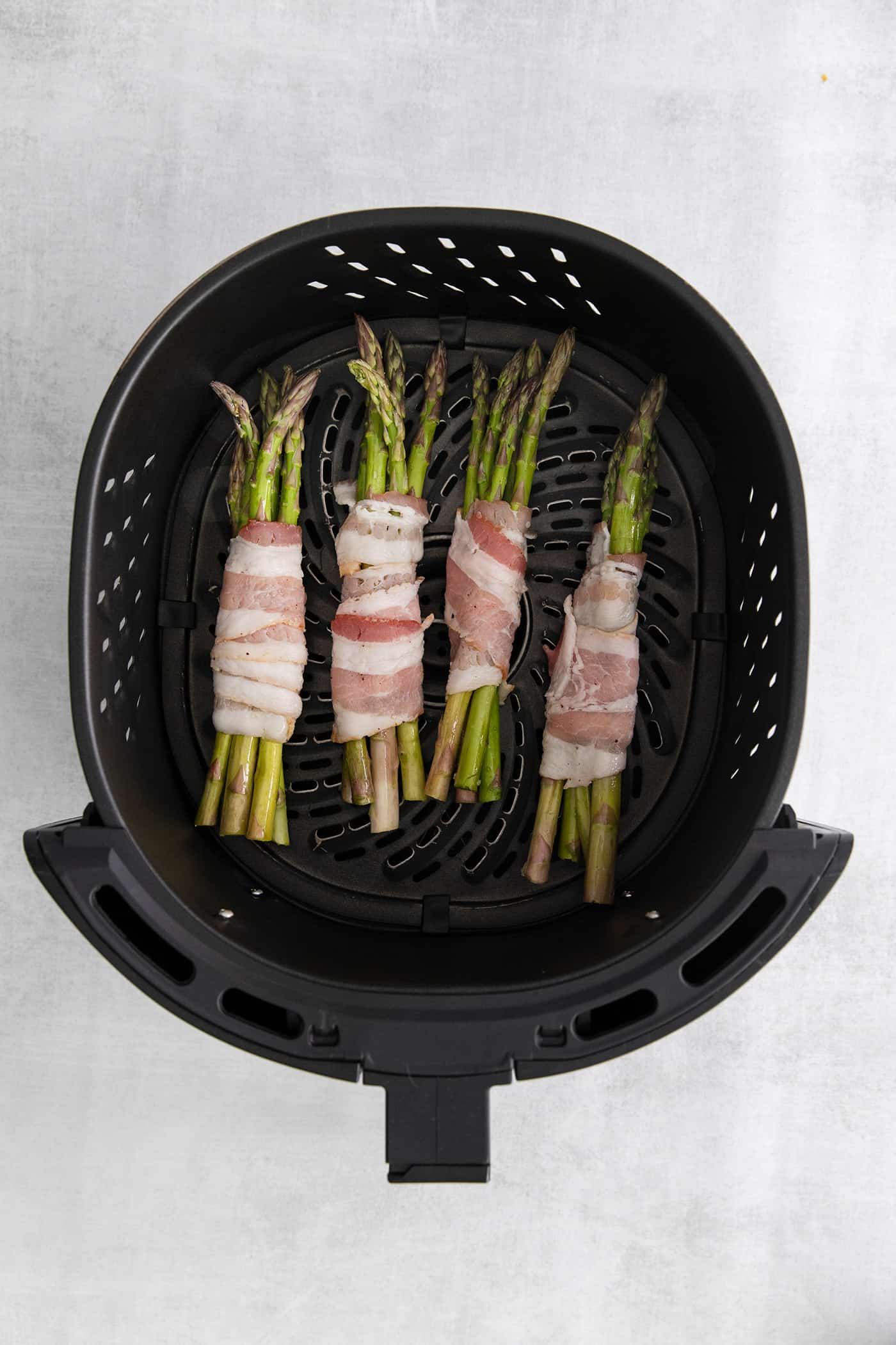 Bacon wrapped asparagus bundles in the air fryer