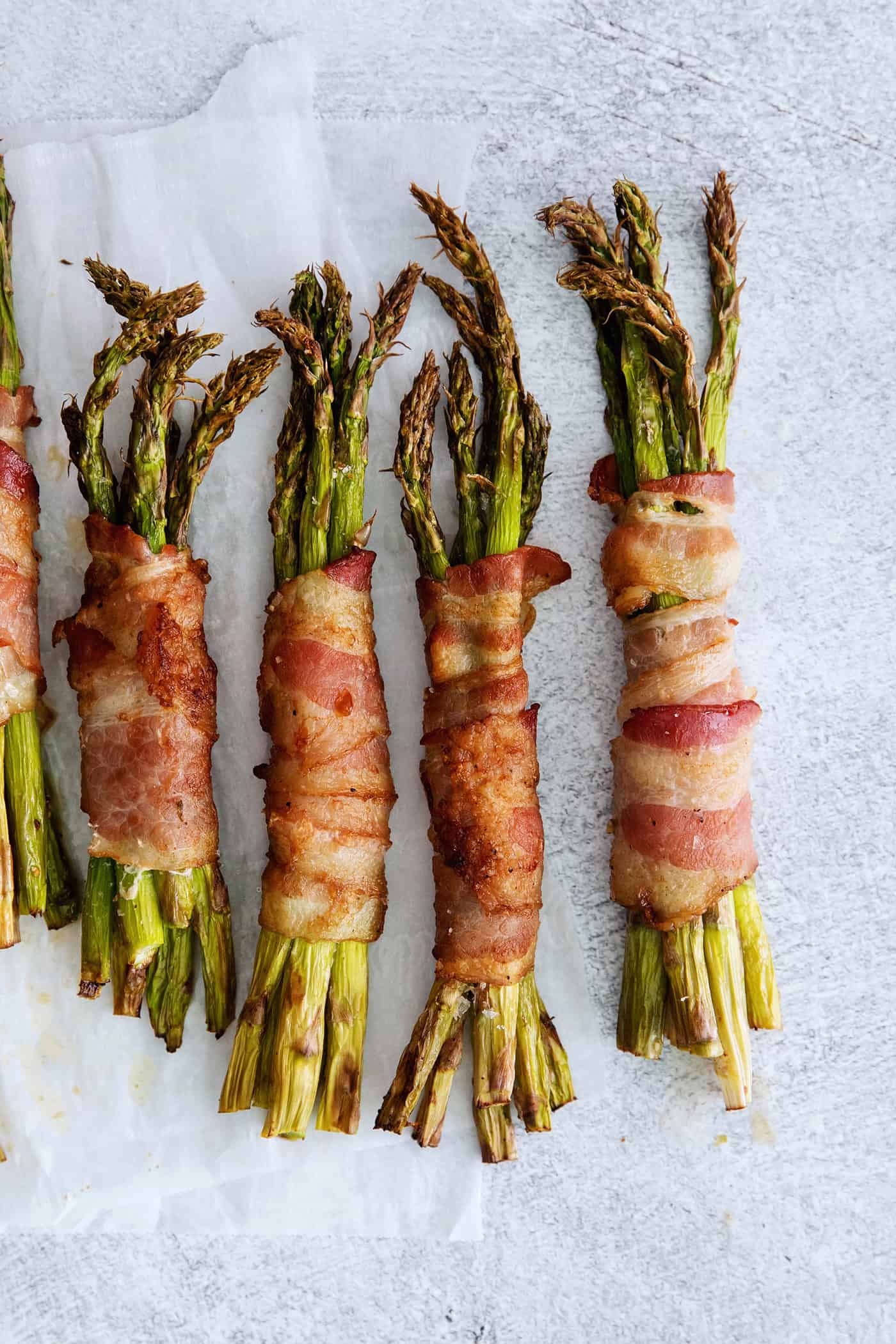 Bundles of asparagus wrapped in bacon