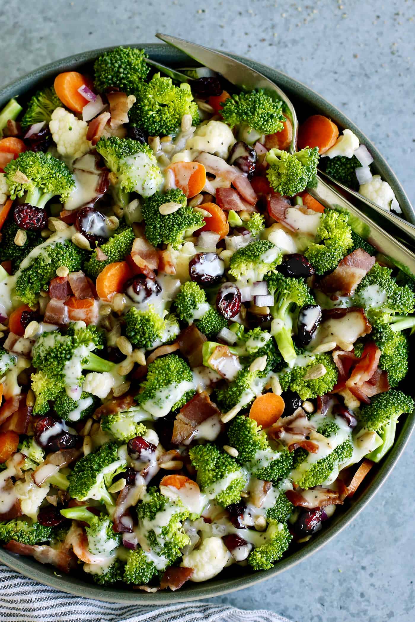 Close up of a bowl of broccoli cauliflower salad