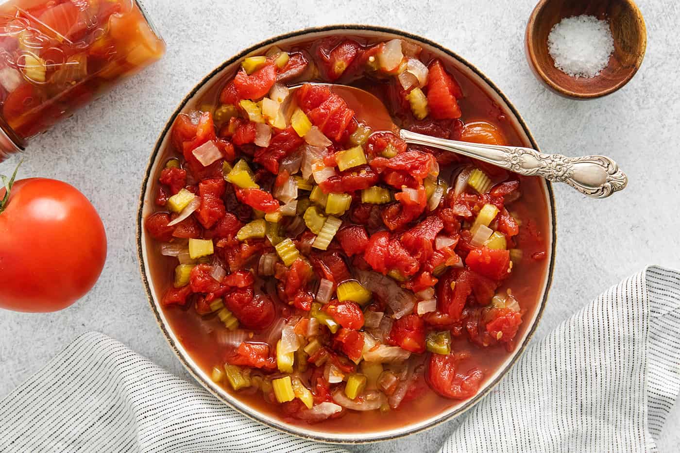 Overhead view of a bowl of chili stewed tomatoes