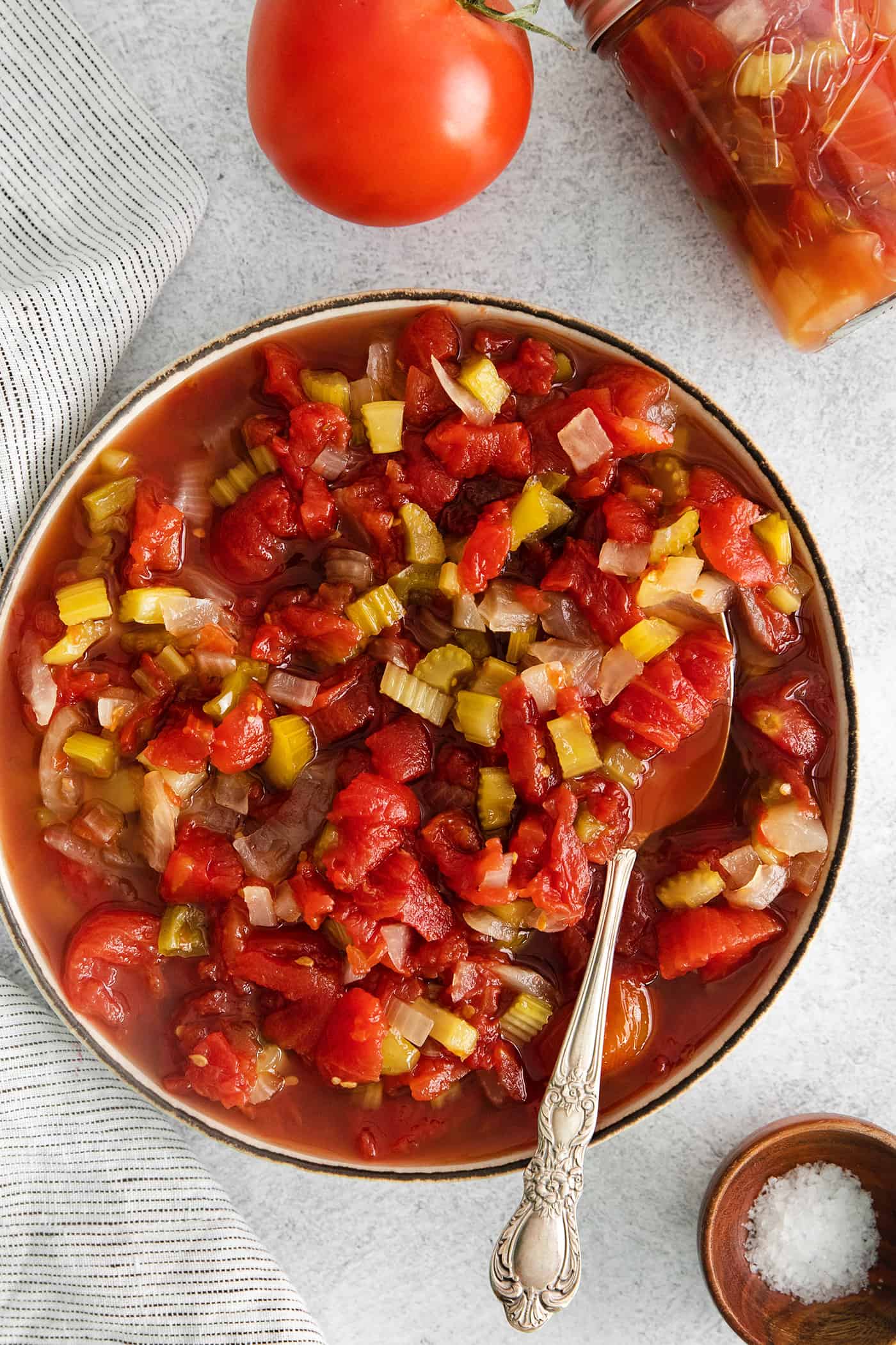 Overhead view of a bowl of chili stewed tomatoes