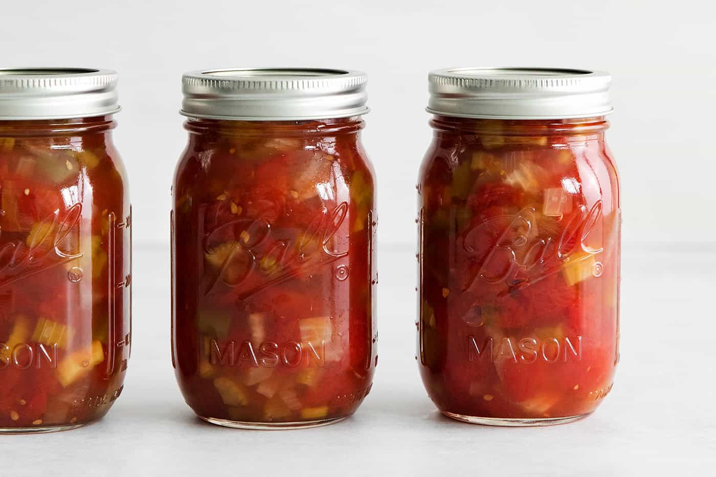 Three jars of chili stewed tomatoes