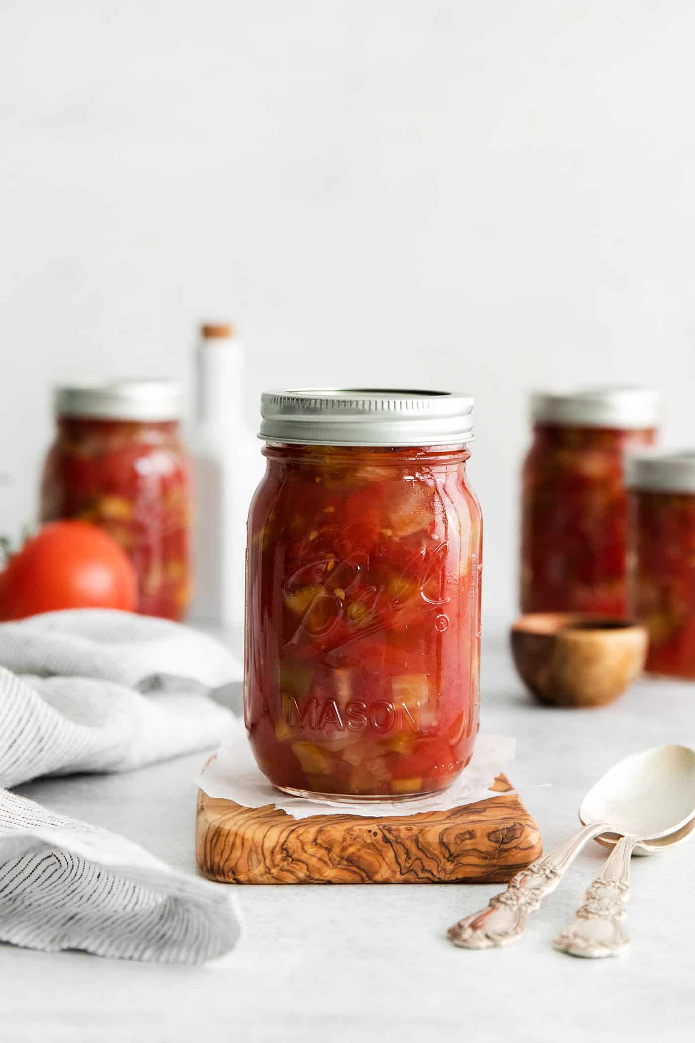 A jar of chili stewed tomatoes