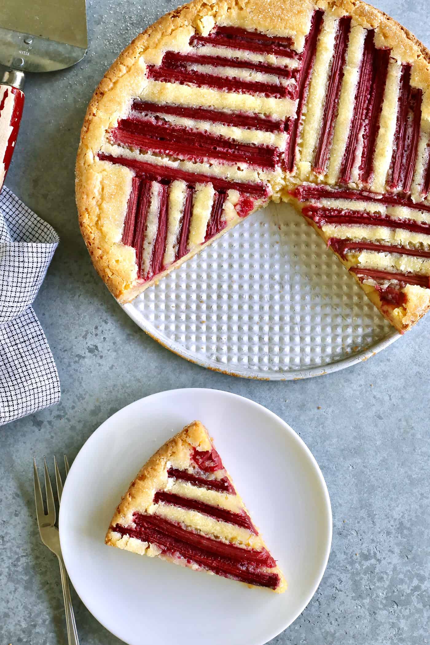 a piece of rhubarb custard cake on a plate