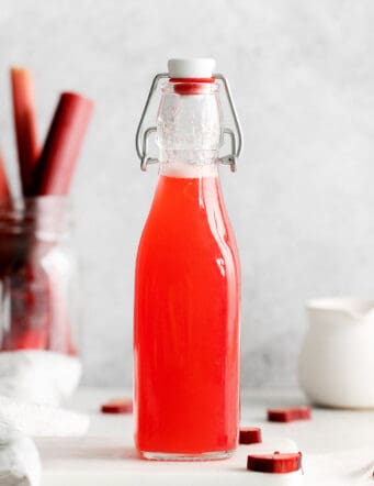 rhubarb syrup in a tall jar