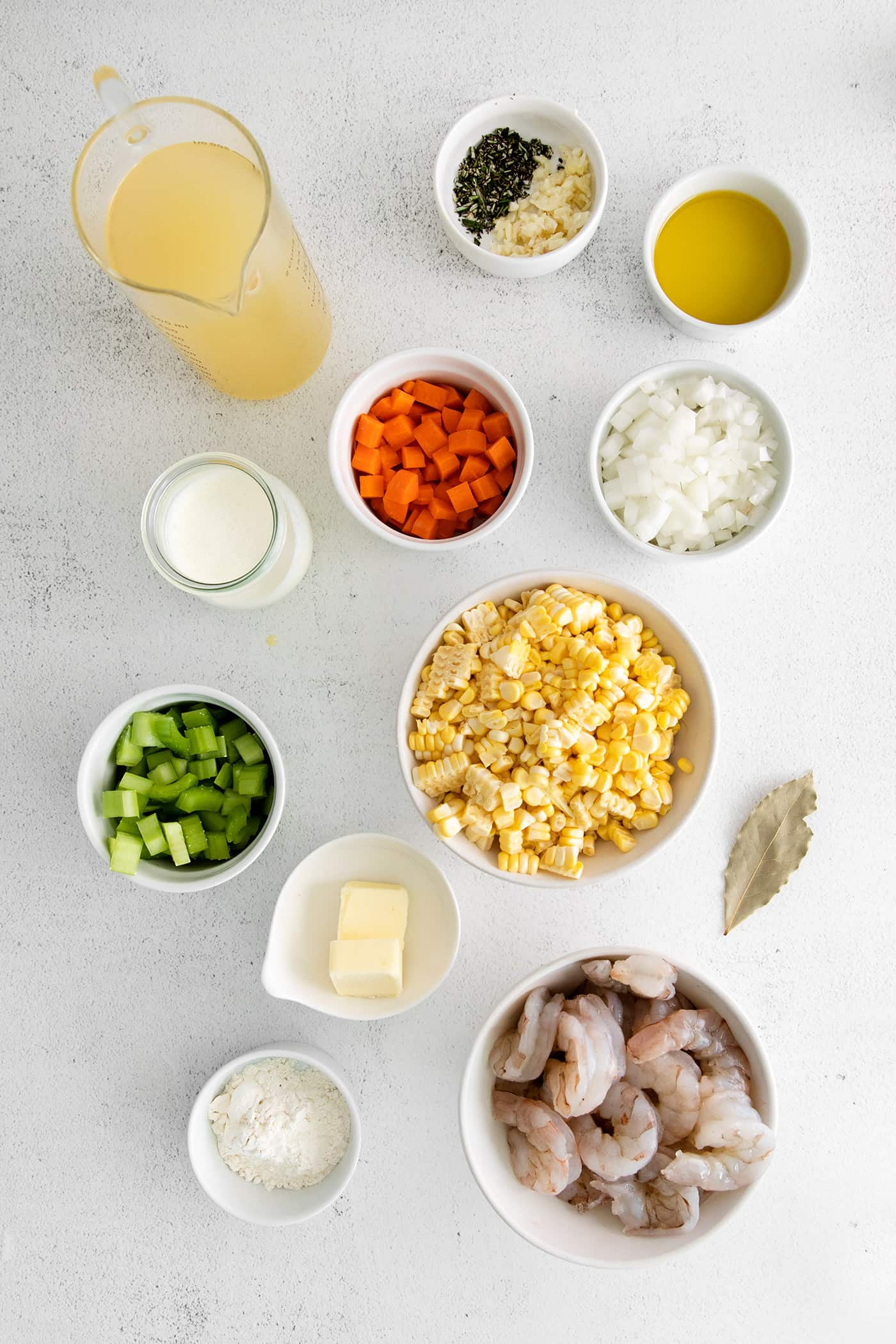 Overhead view of shrimp corn chowder ingredients