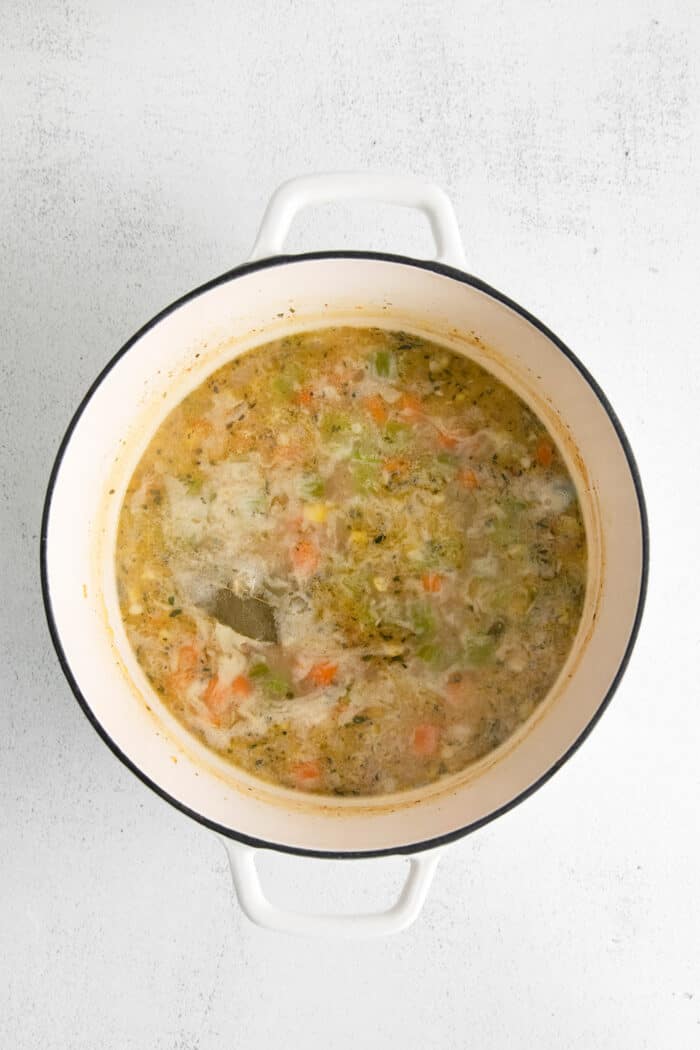 Corn chowder broth in a pot