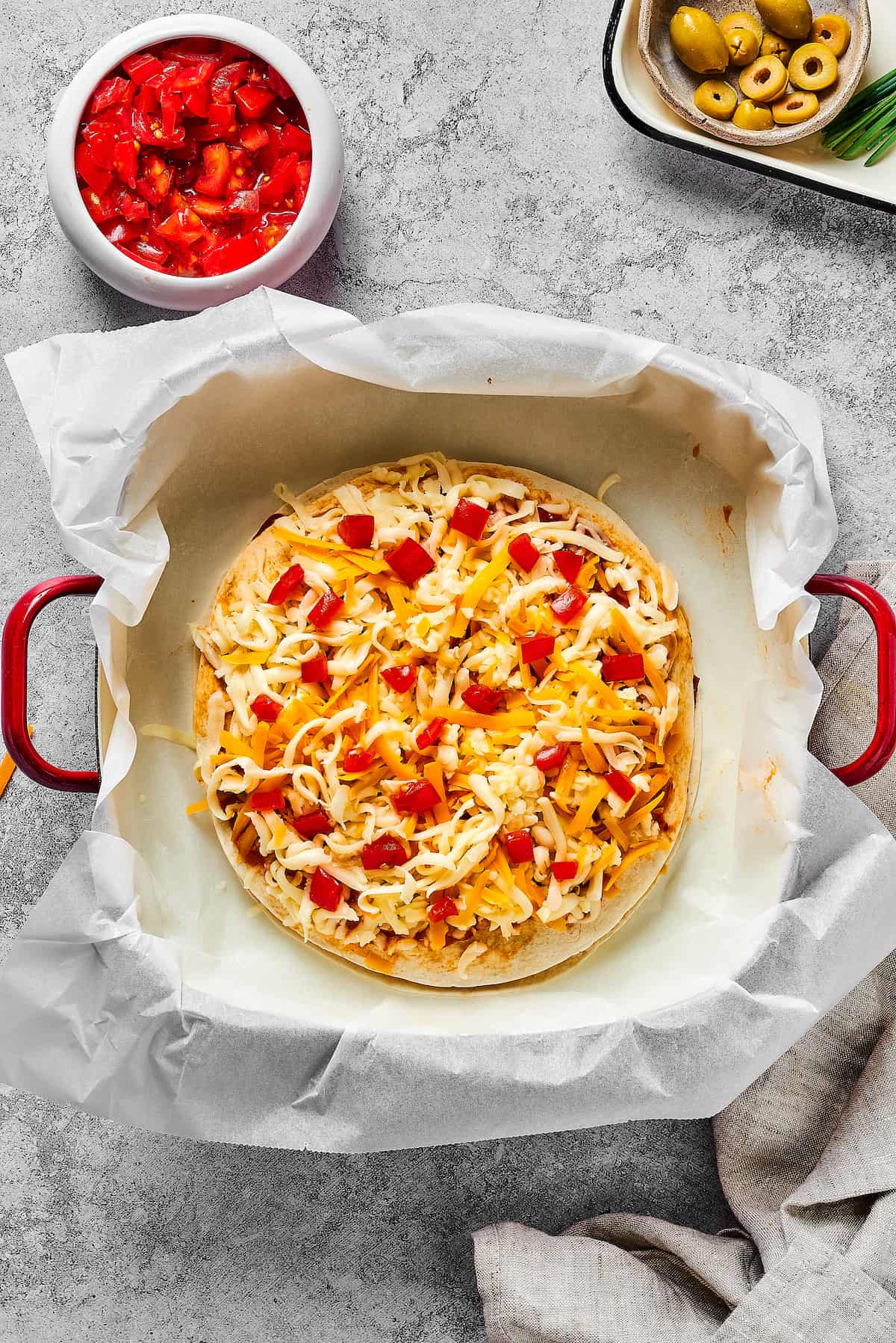 Overhead view of a mexican pizza ready to be baked