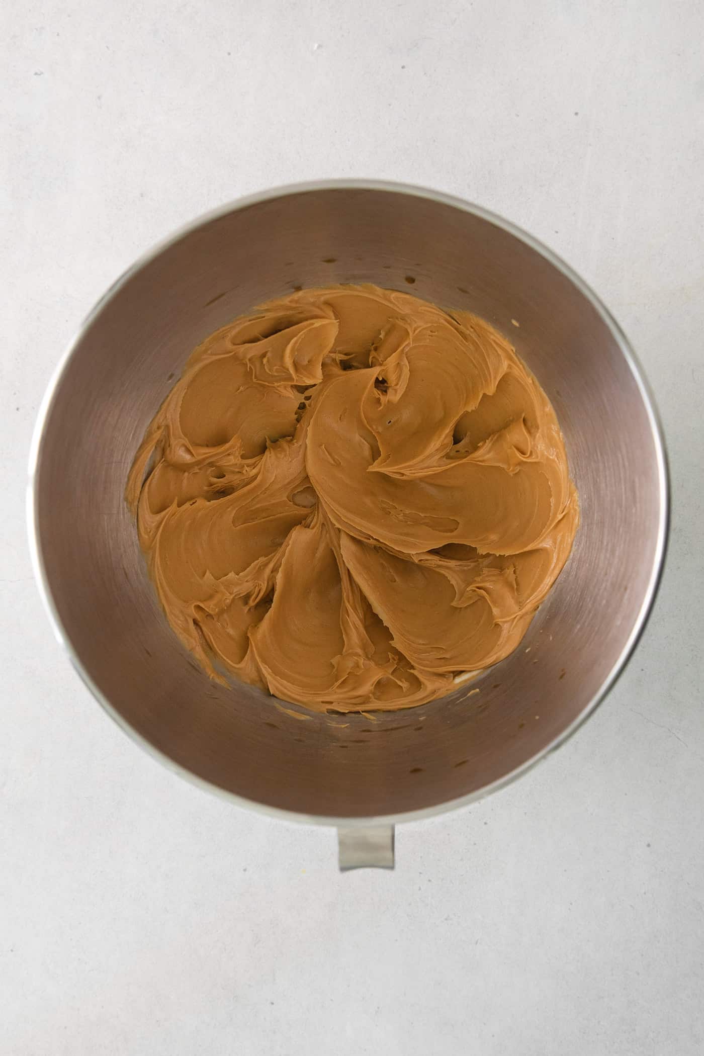 Creamed peanut butter and butter in a mixing bowl