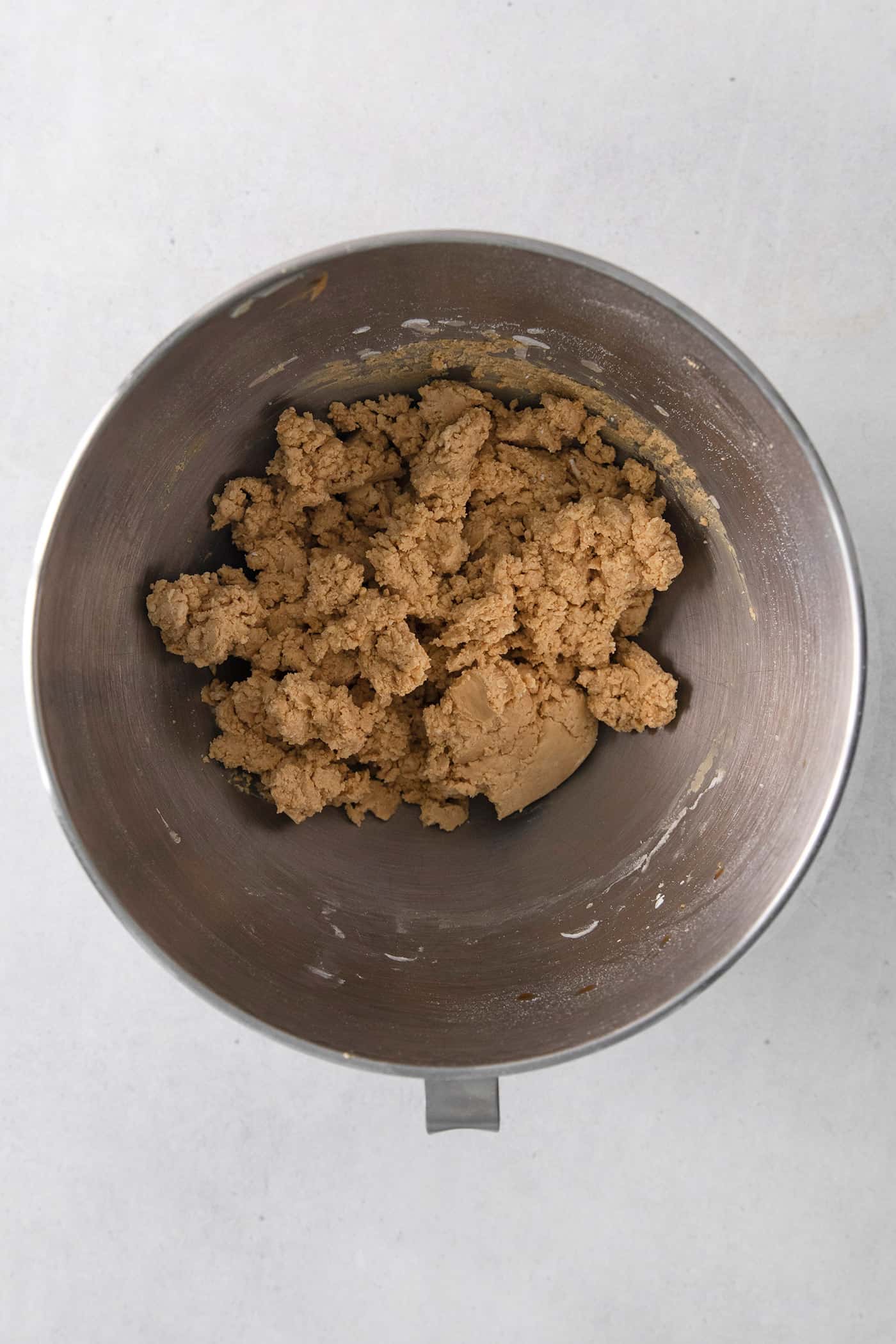 Peanut butter ball dough in a mixing bowl