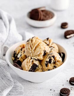 A bowl with scoops of edible oreo cookie dough