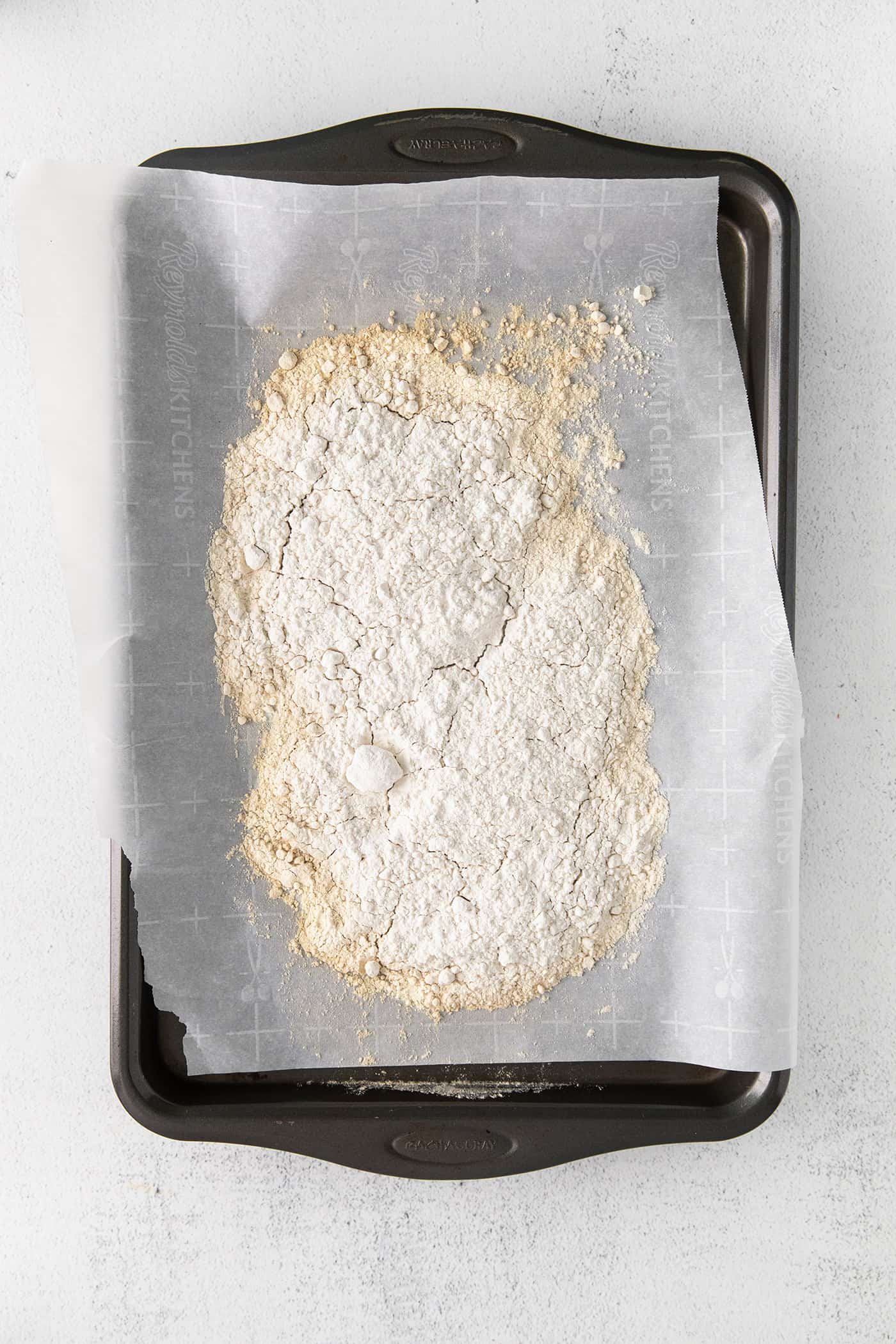 Heat treated flour on a baking sheet