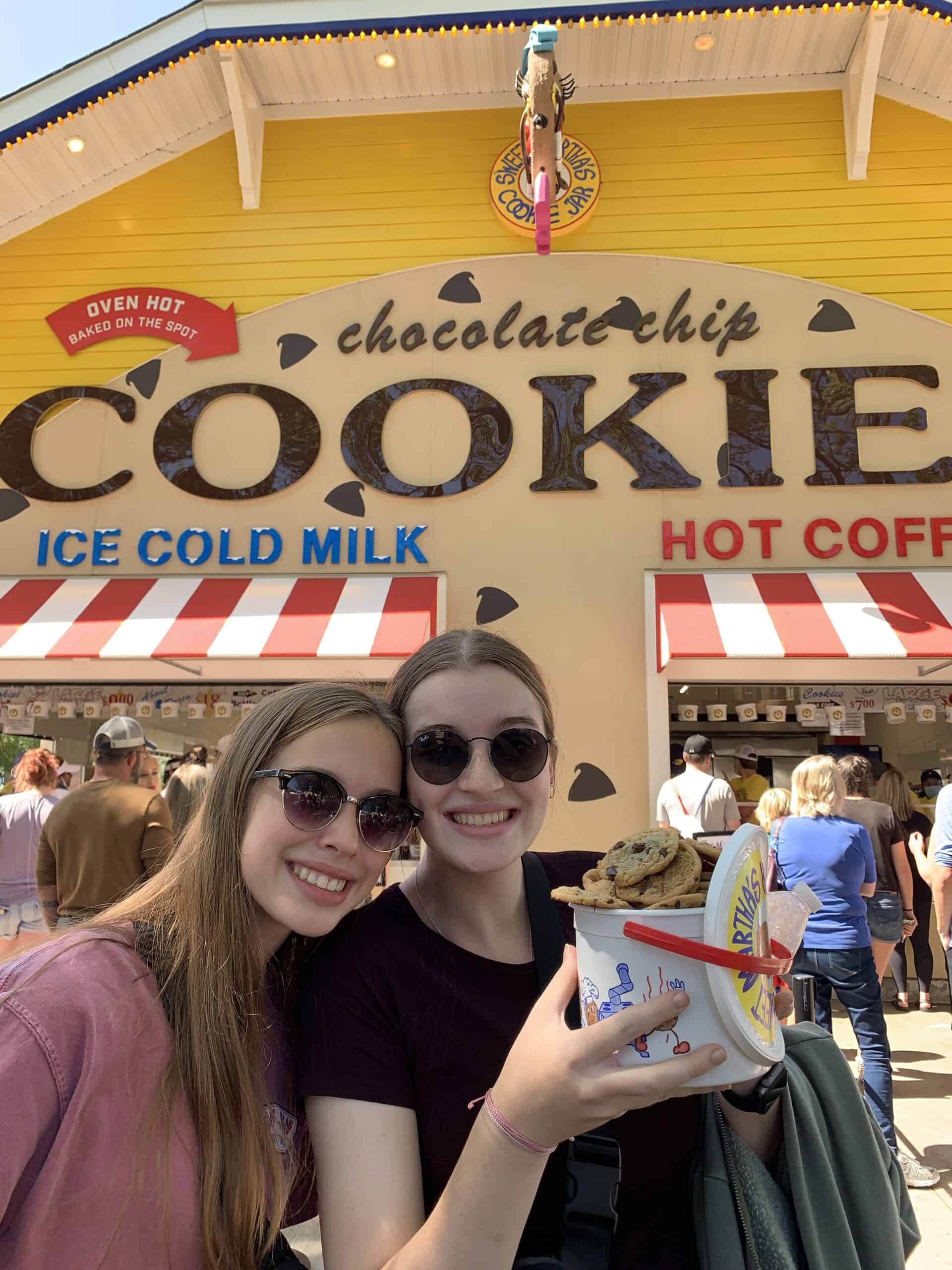 two girls holding a bucket of Martha's Cookies at the MN State Fair