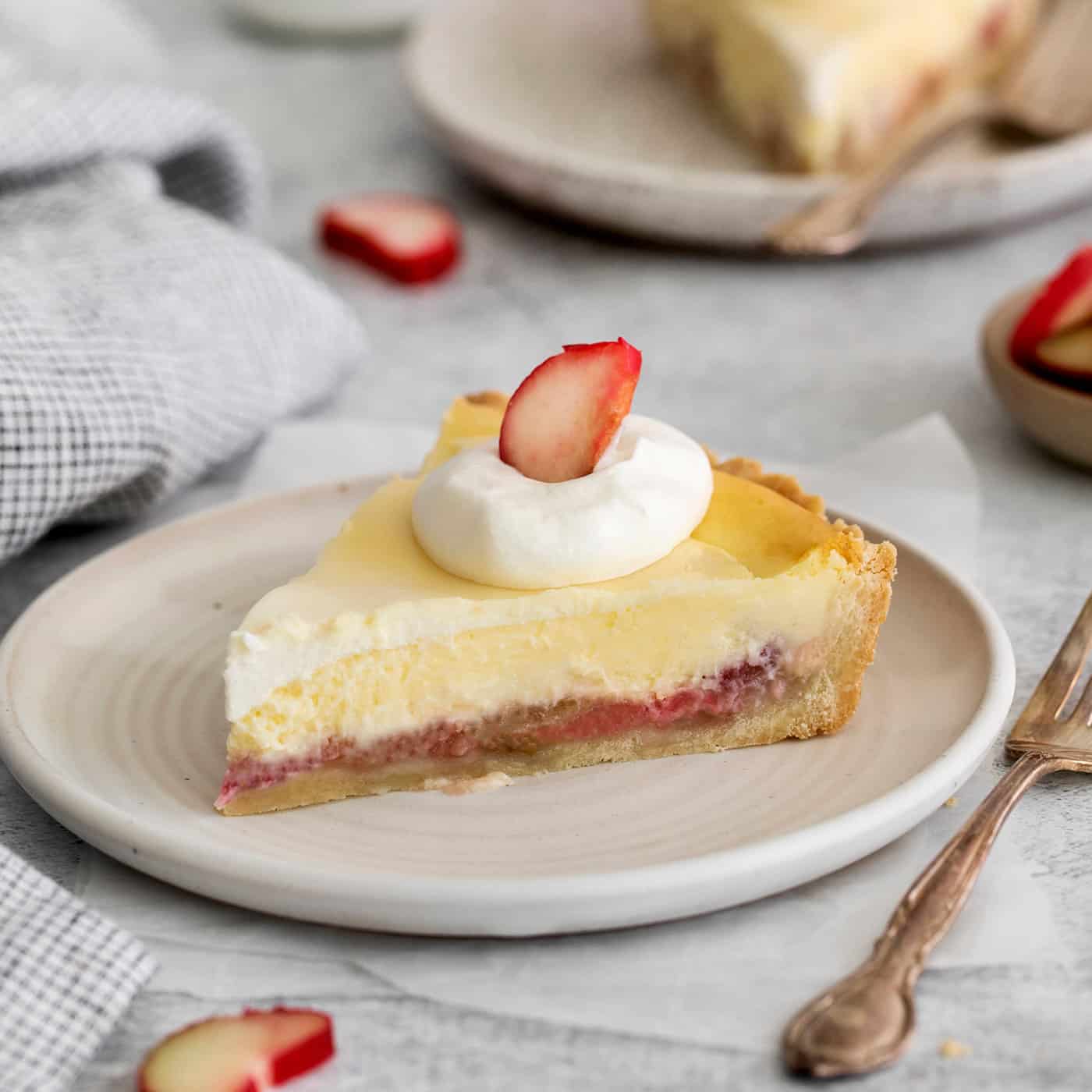 a piece of pie with cream cheese and rhubarb