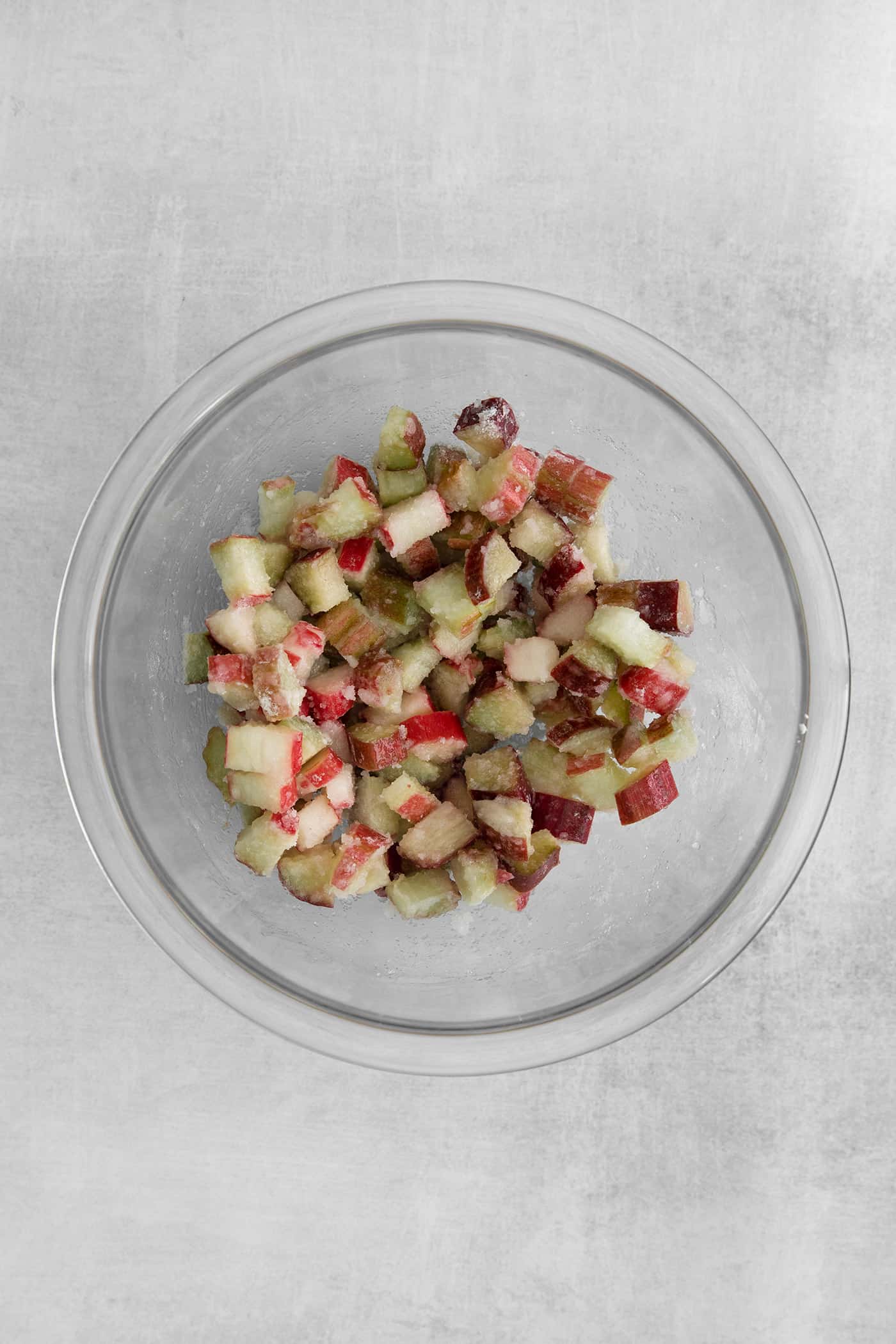 rhubarb layer mixed together, in a clear bowl