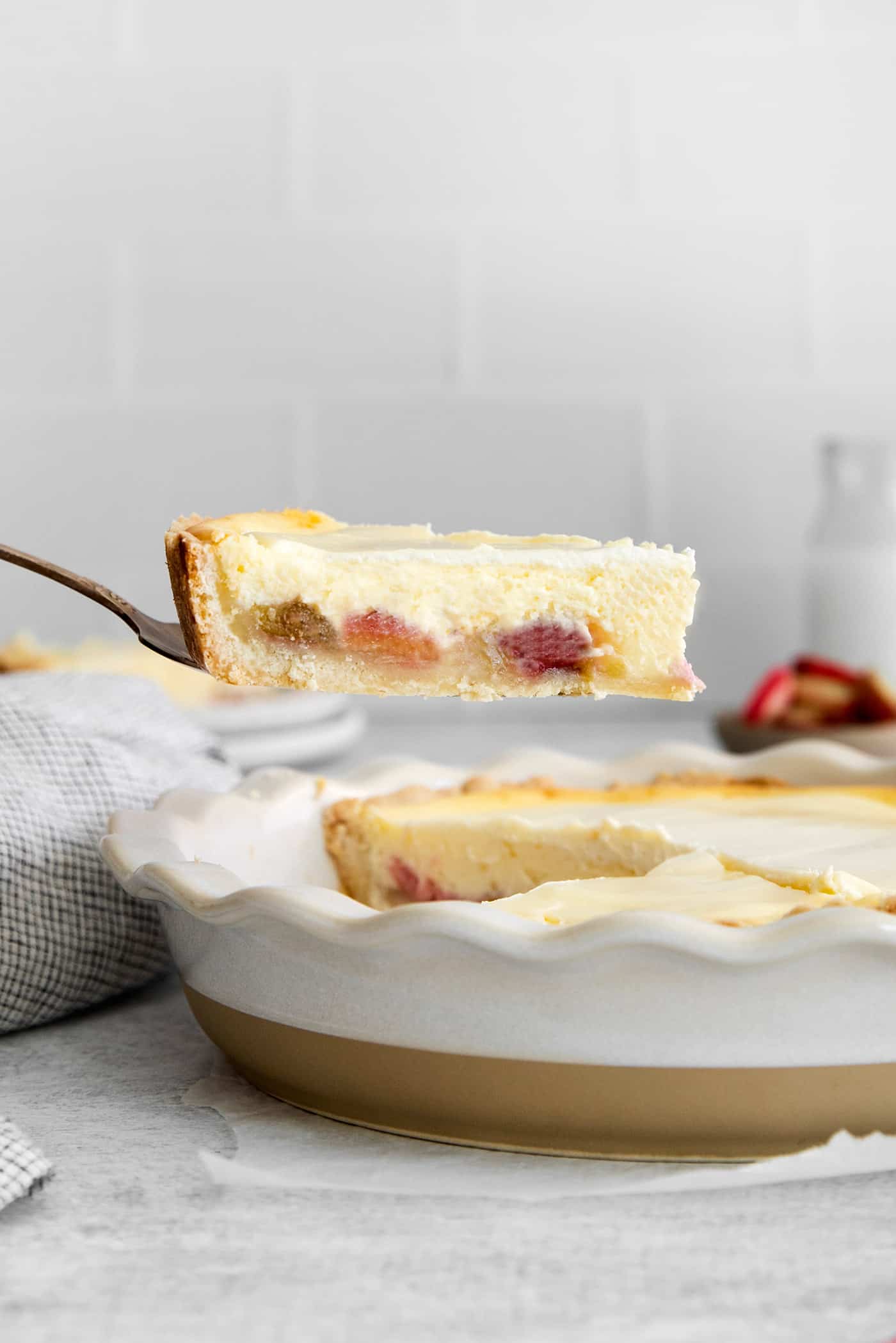 pulling a slice of pie out of the pie pan