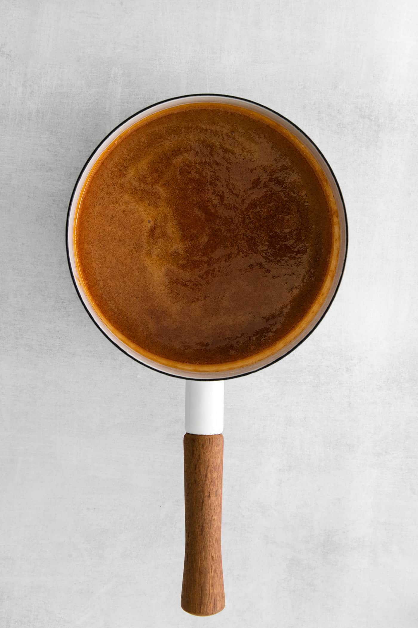 Dark caramel in a sauce pan