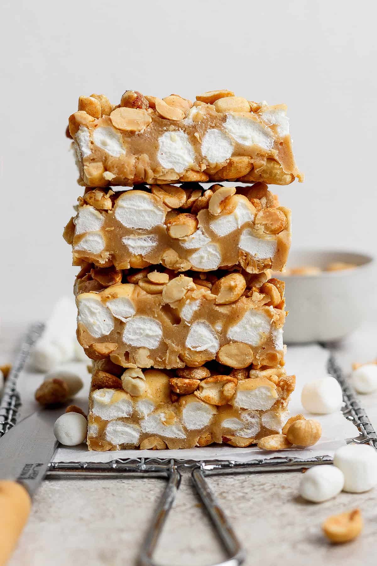 Stack of 4 salted nut roll bars.