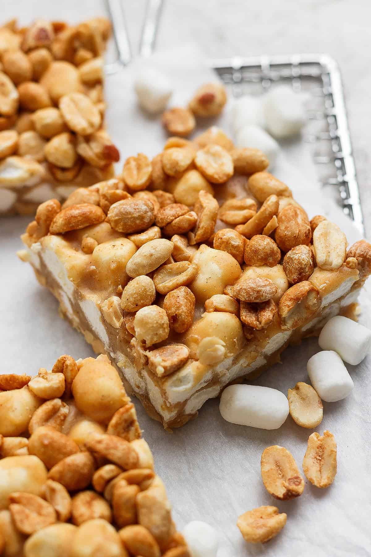 3 salted nut roll bars with peanuts and marshmallows.