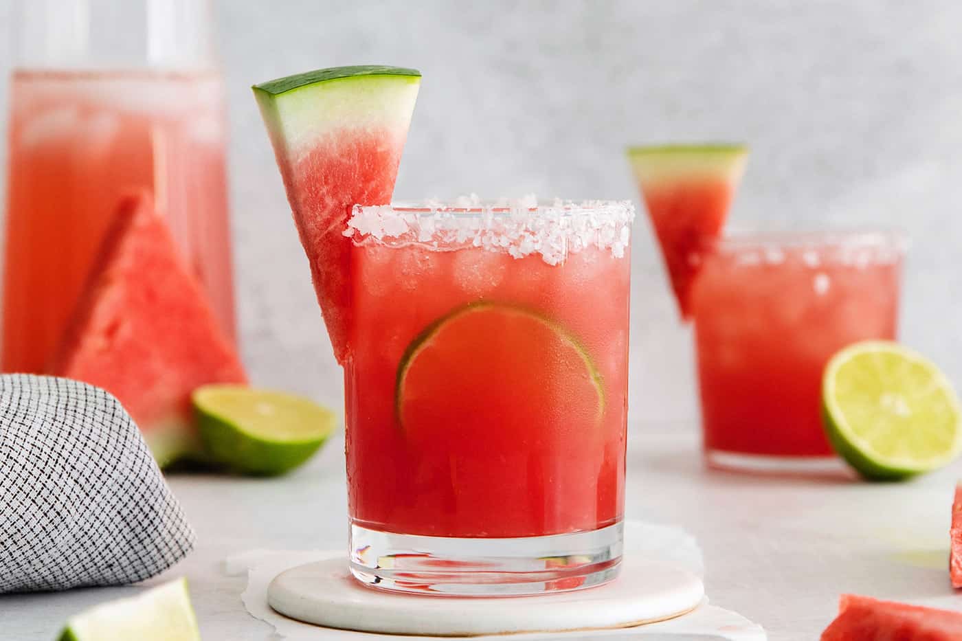 a salt-rimmed glass of watermelon margarita